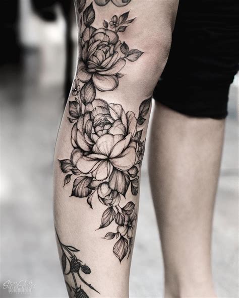 black and white thigh tattoo|upper leg tattoos for females.